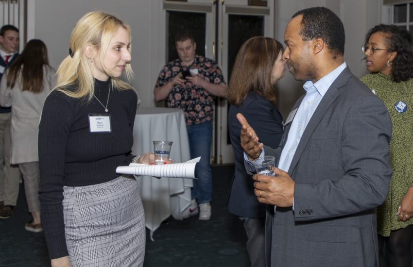A student and alum network at an event